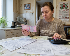 Платежки за коммуналку. Фото: сгенерированное ИИ