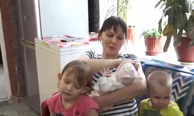 Многодетная семья, скриншот с видео