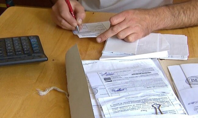 Коммунальные платежки / скриншот из видео