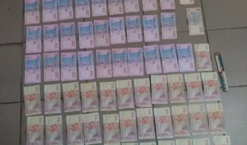 СБУ изъяла "гривневый ковер" у вымогателей