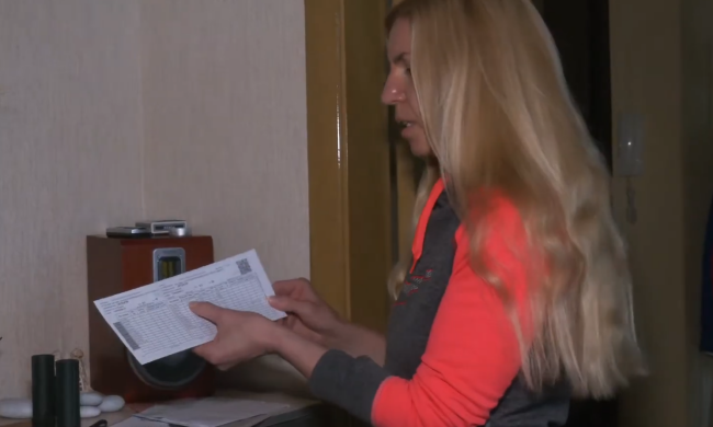 Платежки за коммуналку. Фото: скрин youtube