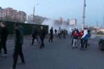 Мордою в асфальт: у Києві копи схопили десятки озброєних "тітушок"