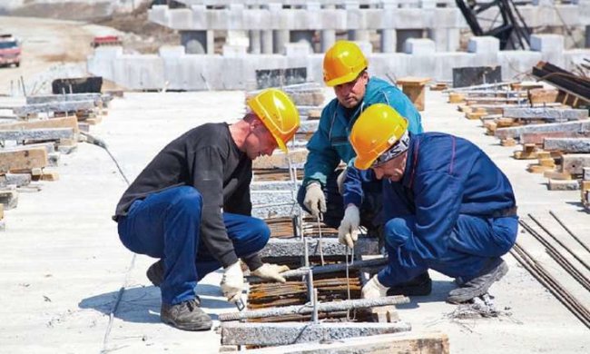 будівельники