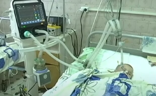 Ребенок страдает от коронавируса, кадр из репортажа Украина: YouTube