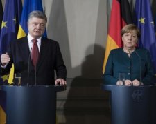 Порошенко поскаржився Меркель на злочини Путіна