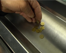 Монети. Фото: скрін youtube