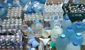 39-річна львів'янка виготовляла незаконну горілку та цигарки (фото)