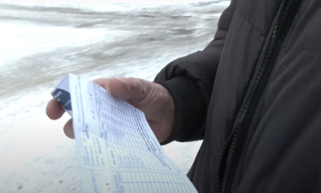 Платежки за коммуналку. Фото: скрин youtube