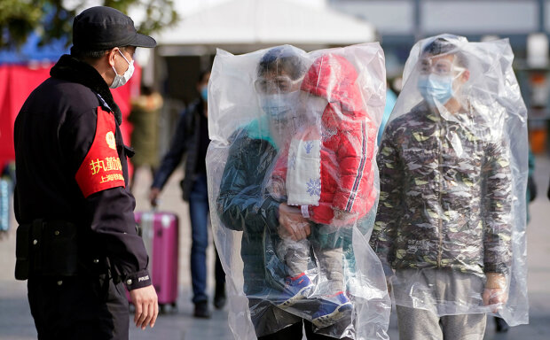 Коронавірус в Китаї, фото: Cheng Min / Xinhua via AP