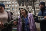 Постраждалі після обстрілу в Маріуполі. Євген Малолєтка