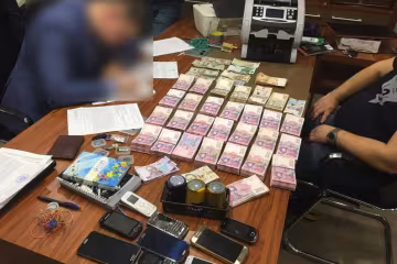 Изъятие денег, фото Zik.ua