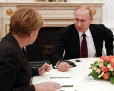 Стало відомо, про що говорили по телефону Меркель і Путін
