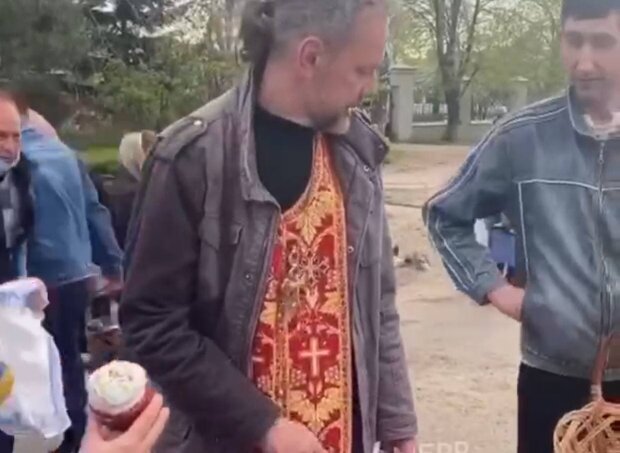 Священик / скріншот з відео