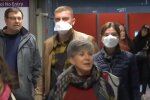 люди в масках, скріншот з відео