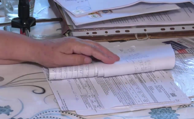 Платіжки за комуналку. Фото: скрін youtube