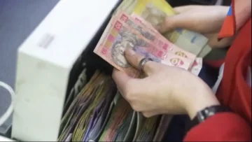 Банкноти гривні в гаманці