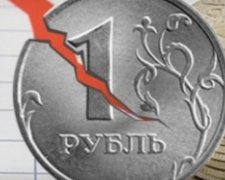 Крутое пике рубля приведет к распаду России через год - эксперт