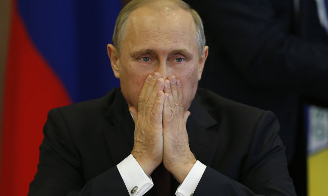 Спортсмени так хотіли селфі з Путіним, що зламали стіл: "а могли й Вову"