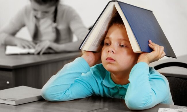 Дитина і книги. Фото з відкритих джерел