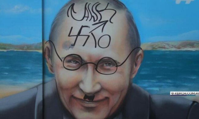 Путину пририсовали свастику и гитлеровские усики (фото) 