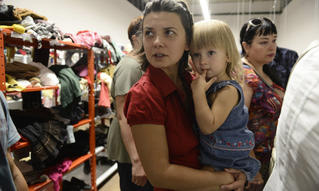 переселенка с ребенком