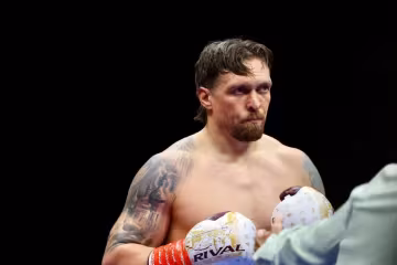Олександр Усик із донькою на вечорі боксу у Львові