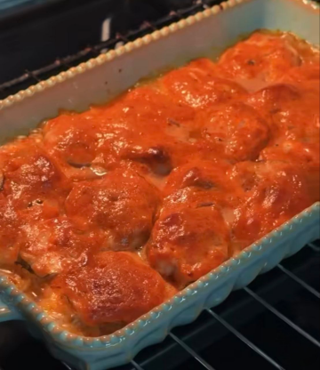 Хек  під соусом на овочевій подушці: фото скрін рецепту