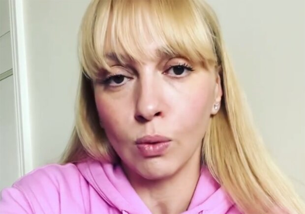 Оля Полякова, скриншот из видео