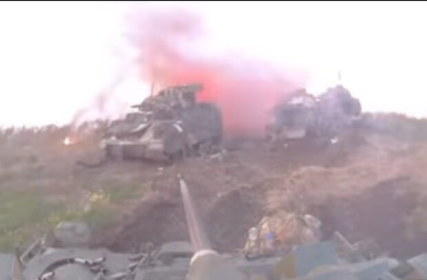 Кадры с поля боя, война в Украине, скриншот из видео