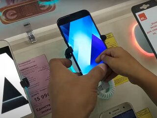 мобільні телефони, скріншот з відео