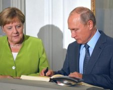 Меркель рассказала Порошенко, о чем шепталась с Путиным