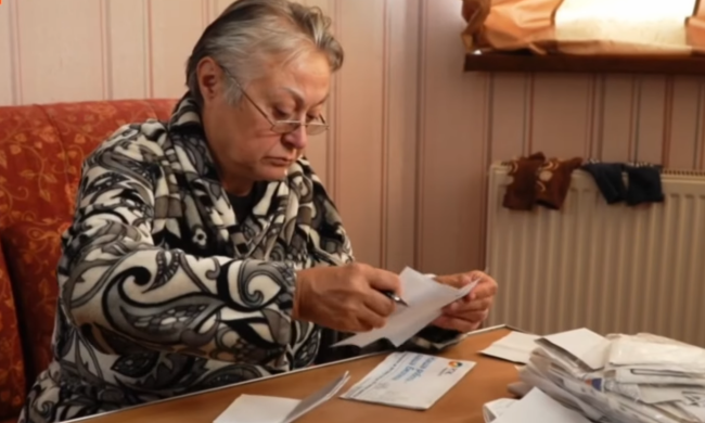 Платежки за коммуналку. Фото: скрин youtube