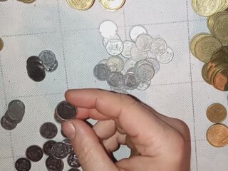 Монети. Фото: скрін youtube