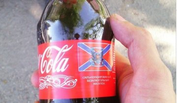 Терористи продають "Сoca-cola" зі своєю символікою