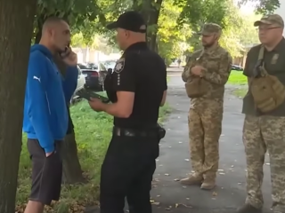 Полиция и ТЦК. Фото: скрин youtube