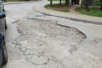 Ями на дорогах у Харкові, фото: Telegram