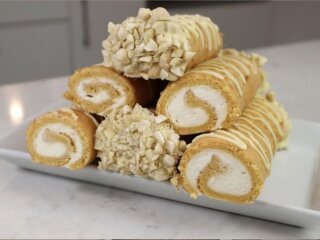 Апельсинові бісквітні рулетики з вершками: фото скрін Ютуб