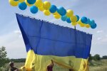 Украинский флаг над Донецком, скриншот: Facebook