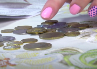 Монети. Фото: скрін youtube