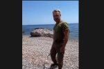 Охранник с нагайкой, скриншот из видео