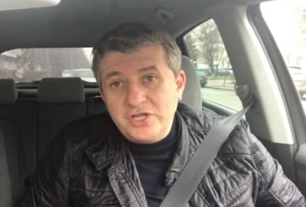Юрий Романенко, скрин из видео
