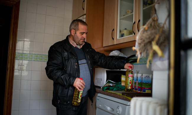 Мужчина на кухне, фото: Getty Images
