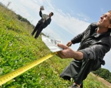 Україна погодилася розплатитися землею за кредит МВФ