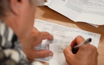 Счета за коммуналку. Фото: скрин youtube