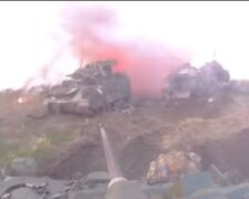 Кадри з поля бою, війна в Україні, скріншот з відео