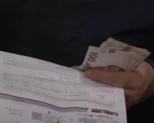 Платежка за коммуналку. Фото: скрин youtube