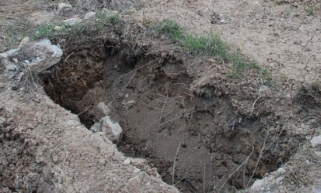 В Винницкой области неизвестные пытались достать из могилы тело женщины