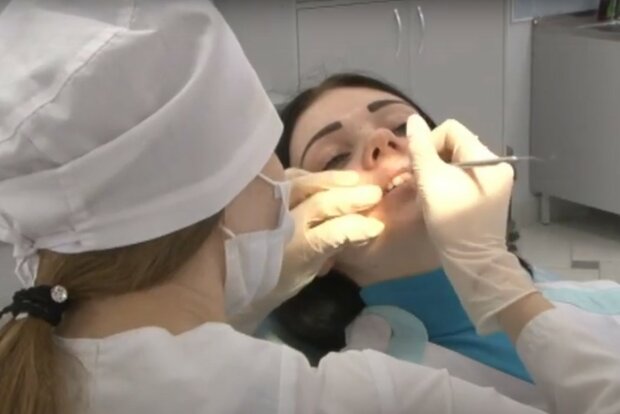 стоматолог, скриншот из видео